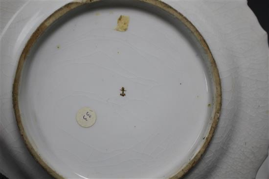 A Chelsea gold anchor bird and insect plate and a similar pair of floral plates, c. 1765, 22 and 23cm